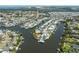 Waterfront neighborhood with stunning aerial views of homes nestled along scenic canals, offering direct access to the water at 424 Bahama Grande Blvd, Apollo Beach, FL 33572