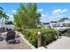 Beautiful waterfront backyard featuring a boat dock, fire pit, and comfortable seating for outdoor enjoyment at 424 Bahama Grande Blvd, Apollo Beach, FL 33572