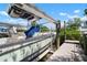 View of boat lift and dock, offering convenient waterfront access at 424 Bahama Grande Blvd, Apollo Beach, FL 33572