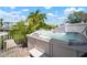 Inviting hot tub surrounded by lush landscaping, perfect for relaxing outdoors at 424 Bahama Grande Blvd, Apollo Beach, FL 33572