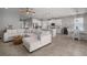 Spacious living area connecting to a modern kitchen and dining space, featuring a large sectional sofa at 424 Bahama Grande Blvd, Apollo Beach, FL 33572