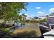 Scenic waterfront view with boat docks and lush landscaping at 424 Bahama Grande Blvd, Apollo Beach, FL 33572