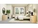 Bright bedroom with large windows, neutral tones, natural accents, and an accent chair at 4807 Southern Valley Loop, Brooksville, FL 34601