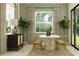 Inviting dining room with a circular table, chairs, large windows and indoor plants at 4807 Southern Valley Loop, Brooksville, FL 34601