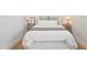 Cozy bedroom features plush bedding, nightstands, and soothing natural light at 5298 Oxford N Ave, St Petersburg, FL 33710