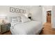 Serene main bedroom featuring a plush bed and ensuite walk-in closet at 5298 Oxford N Ave, St Petersburg, FL 33710