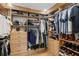 Spacious walk-in closet with custom shelving and storage for organization at 5298 Oxford N Ave, St Petersburg, FL 33710