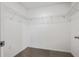 A walk-in closet with carpet, white walls, and wire shelving for easy organization and plenty of storage at 5429 Companion Ln, Tampa, FL 33619