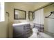 Updated bathroom with gray vanity, white countertop, and shower-tub combo at 6765 Ralston Beach Cir, Tampa, FL 33614