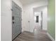 Welcoming entryway featuring updated flooring, large door and easy access to other living spaces at 6765 Ralston Beach Cir, Tampa, FL 33614