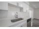 Bright kitchen featuring stainless steel appliances, white subway tile backsplash and stone countertops at 6765 Ralston Beach Cir, Tampa, FL 33614