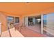 Relaxing balcony with seating and stunning views of the interior with dining set at 7430 Sunshine Skyway S Ln # 403, St Petersburg, FL 33711