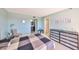 Comfortable bedroom with adjacent bathroom and large dresser storage at 7430 Sunshine Skyway S Ln # 403, St Petersburg, FL 33711