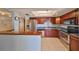 Well-equipped kitchen with stainless steel appliances and ample cabinet space at 7430 Sunshine Skyway S Ln # 403, St Petersburg, FL 33711