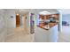 Well-equipped kitchen with stainless steel appliances and serving bar at 7430 Sunshine Skyway S Ln # 403, St Petersburg, FL 33711
