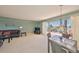 Light-filled living space with direct access to the balcony offering stunning water views at 7430 Sunshine Skyway S Ln # 403, St Petersburg, FL 33711
