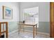 Functional office space with a large window and neutral tones at 747 Stillview Cir, Brandon, FL 33510