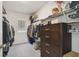 Well-organized walk-in closet with shelving and hanging space, offering ample storage at 7591 Cypress Walk Dr, New Port Richey, FL 34655