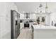 Well-equipped kitchen featuring stainless steel appliances and a breakfast bar at 8721 N Whittier St, Tampa, FL 33617