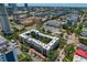 Expansive aerial view capturing condo building surrounded by green trees, city landscape, and neighborhood at 105 4Th Ne Ave # 220, St Petersburg, FL 33701