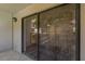 View of a balcony with sliding glass doors that lead to the living room at 105 4Th Ne Ave # 220, St Petersburg, FL 33701