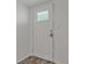 Interior entryway with neutral-toned paint and a white door with a window at 105 4Th Ne Ave # 220, St Petersburg, FL 33701