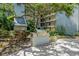 Outdoor grill station in a landscaped community garden at 105 4Th Ne Ave # 220, St Petersburg, FL 33701