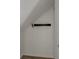 Small storage area with white painted concrete block walls and wood look flooring at 105 4Th Ne Ave # 220, St Petersburg, FL 33701
