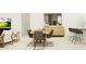 Bright dining area with a wooden table, comfortable seating for six, and stylish decor at 11825 Sparkling Topaz Cv, Parrish, FL 34219