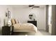 Cozy bedroom featuring stylish furnishings, ample natural light, and minimalist decor at 12965 Shining Blue Nile Ln, Parrish, FL 34219