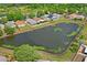 Home with solar panels near pond at 13131 Early Run Ln, Riverview, FL 33578