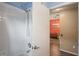 Bathroom featuring a shower with white tile, seamlessly connecting to living spaces at 13131 Early Run Ln, Riverview, FL 33578
