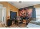 Comfortable bedroom space with Avengers themed wall, perfect for a fan's retreat at 13131 Early Run Ln, Riverview, FL 33578