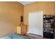 This bedroom offers a closet, dresser, and bookcase for storage and display at 13131 Early Run Ln, Riverview, FL 33578
