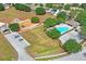 Aerial view of neighborhood pool and playground, highlighting the community's Gathering-friendly environment at 13131 Early Run Ln, Riverview, FL 33578