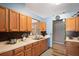 Lovely kitchen with stainless steel appliances, stylish backsplash, and bright countertops at 13131 Early Run Ln, Riverview, FL 33578
