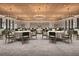 Elegant ballroom featuring chandeliers, round tables, and seating, perfect for events at 13511 White Gold Run, Parrish, FL 34219