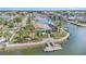 An aerial view of the home shows its canal-front location and direct access to the waterway at 15528 Allmand Dr, Hudson, FL 34667