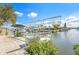 Dock with boat lift offers direct access to the waterfront at 15528 Allmand Dr, Hudson, FL 34667