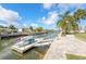 Dock and kayak storage provide easy access for watersports activities at 15528 Allmand Dr, Hudson, FL 34667