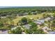 An aerial of a suburban home situated next to a golf course at 16528 Oley Ridge Ct, Tampa, FL 33624