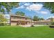 Home boasts a spacious backyard with a pool, patio, and plenty of green space at 16528 Oley Ridge Ct, Tampa, FL 33624