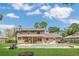 Backyard featuring large pool, patio area, grill, and fenced yard at 16528 Oley Ridge Ct, Tampa, FL 33624