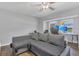 Living room with large window and plenty of space for relaxing or entertaining at 16528 Oley Ridge Ct, Tampa, FL 33624