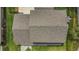 Top-down aerial view highlighting the roof, yard, and house structure at 16528 Oley Ridge Ct, Tampa, FL 33624