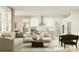 Open-concept living room featuring a plush sofa, armchairs, and a view into the modern kitchen at 18148 Serene Lake Loop, Lutz, FL 33548