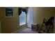 This bedroom offers a serene space, complemented by a window and white closet doors at 18412 Oriole St, Lutz, FL 33558