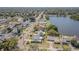 A high altitude shot of a residential area with multiple homes and views of a body of water at 1894 Union St, Clearwater, FL 33763