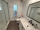 Bright bathroom features a modern vanity, subway tile shower, and sleek fixtures at 1894 Union St, Clearwater, FL 33763