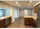 Open-concept kitchen featuring granite countertops and stainless steel appliances at 1894 Union St, Clearwater, FL 33763